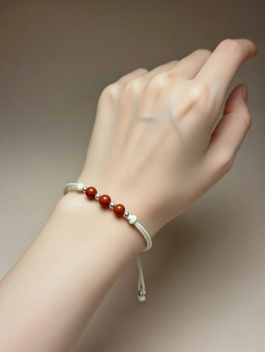 Jaspe Rojo en Pulsera (hilo beige) - Santa Hildegarda
