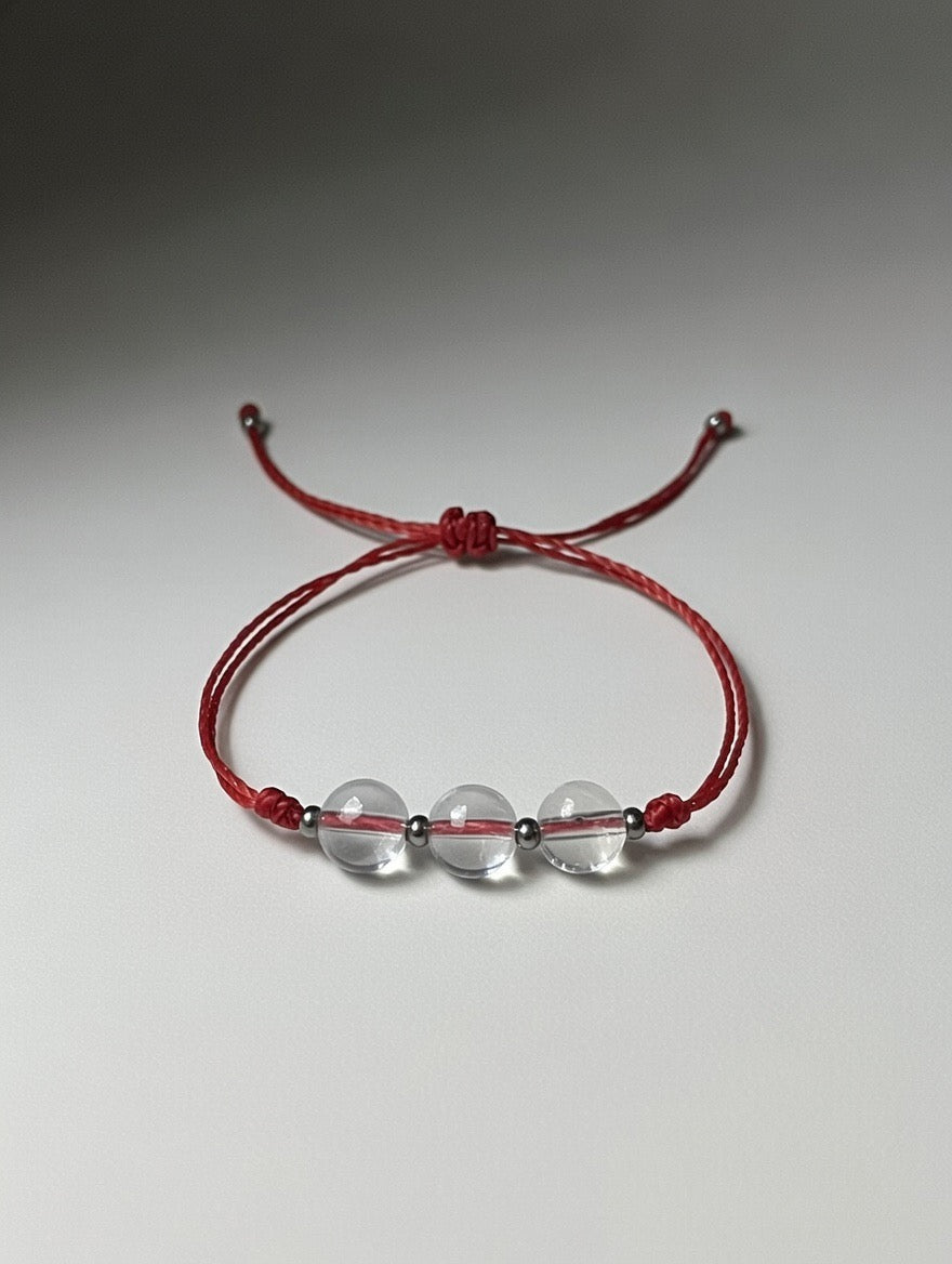 Cristal de Roca en Pulsera (hilo rojo) - Santa Hildegarda